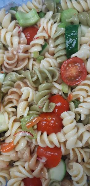 Tri-colour pasta salad<br>Tri-colour pasta tossed in zesty italian dressing, cucumbers. tomatoes, green onions, shredded radishes, carrots and spices<br>Single serve $3 <br>Family size available
